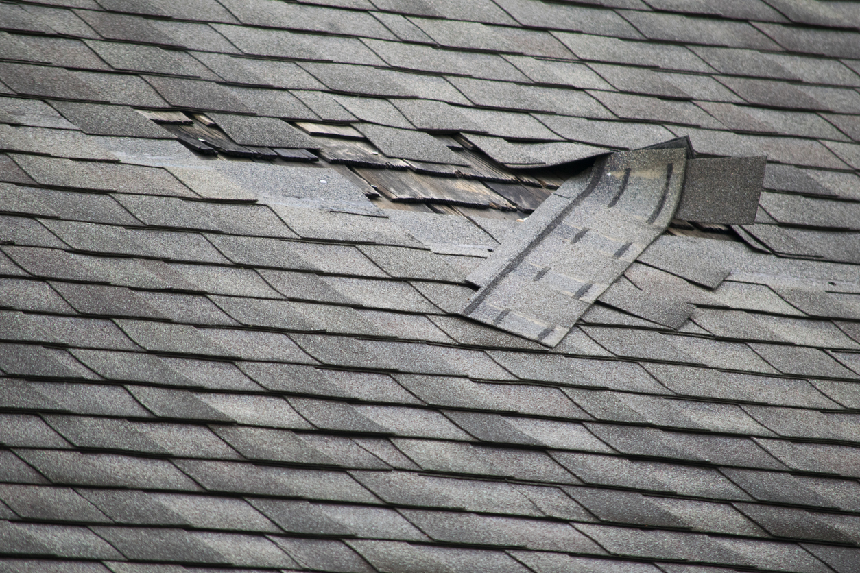 What do I do if shingles are coming off my roof?